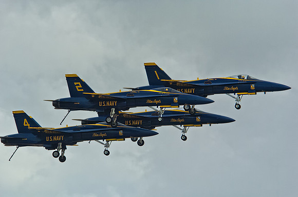 Blue Angels Landing gear down in formation in inclement weather