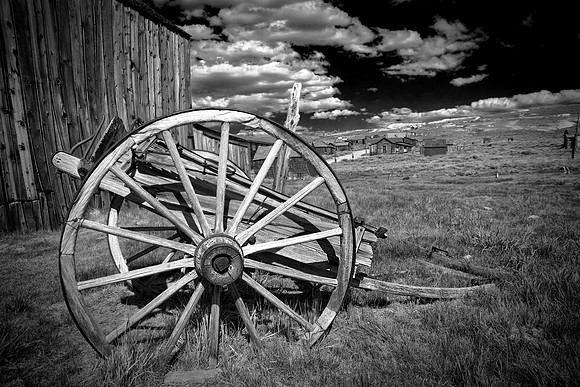 Bodie Wagon Wheel with clouds B & W
