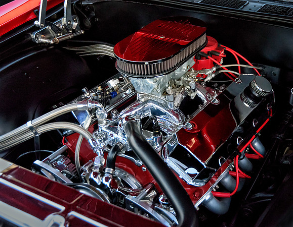 Red Car reflection on chrome engine