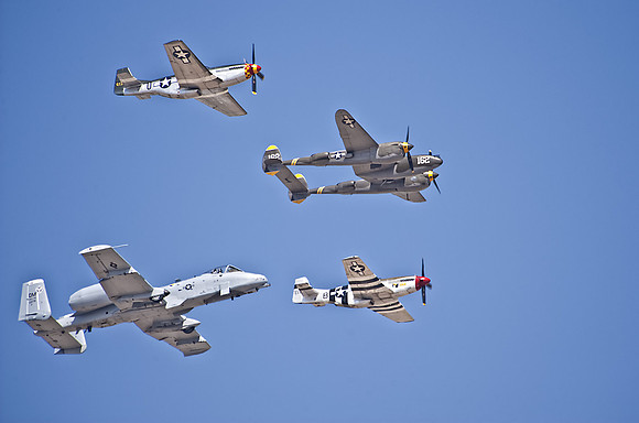 2 P-51's with a P-38 and A-10