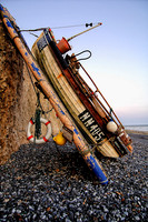 Boat on a Pebble Beach