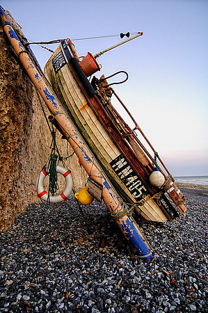 Boat on a Pebble Beach