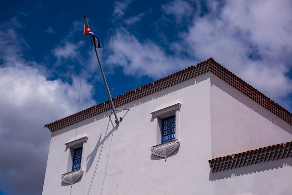 Santiago City building flying Cuban Flag