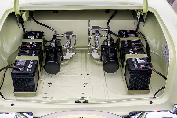 Hydraulics to lower vehicle